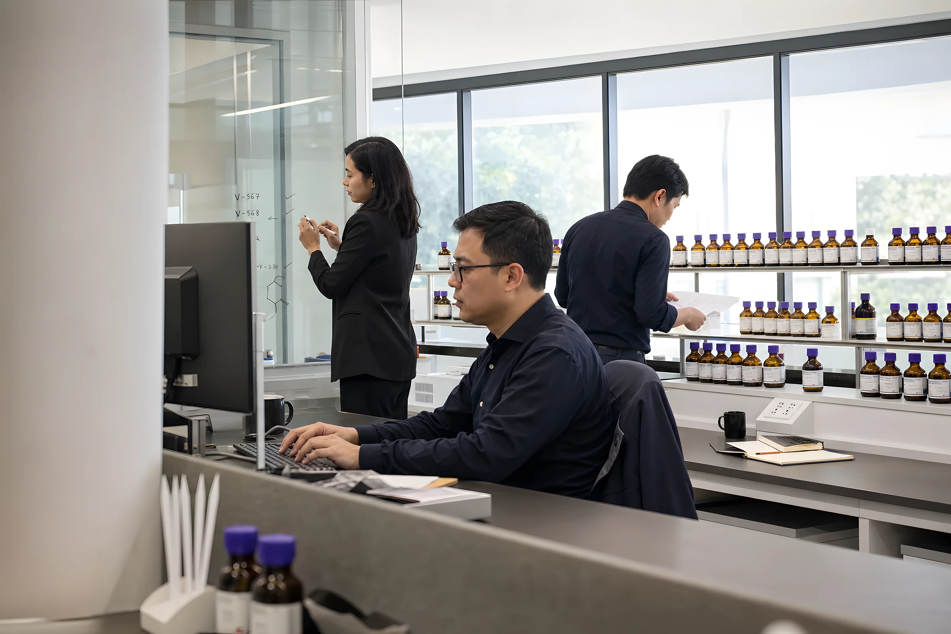 VKA colleagues at work in the open-plan Singapore office