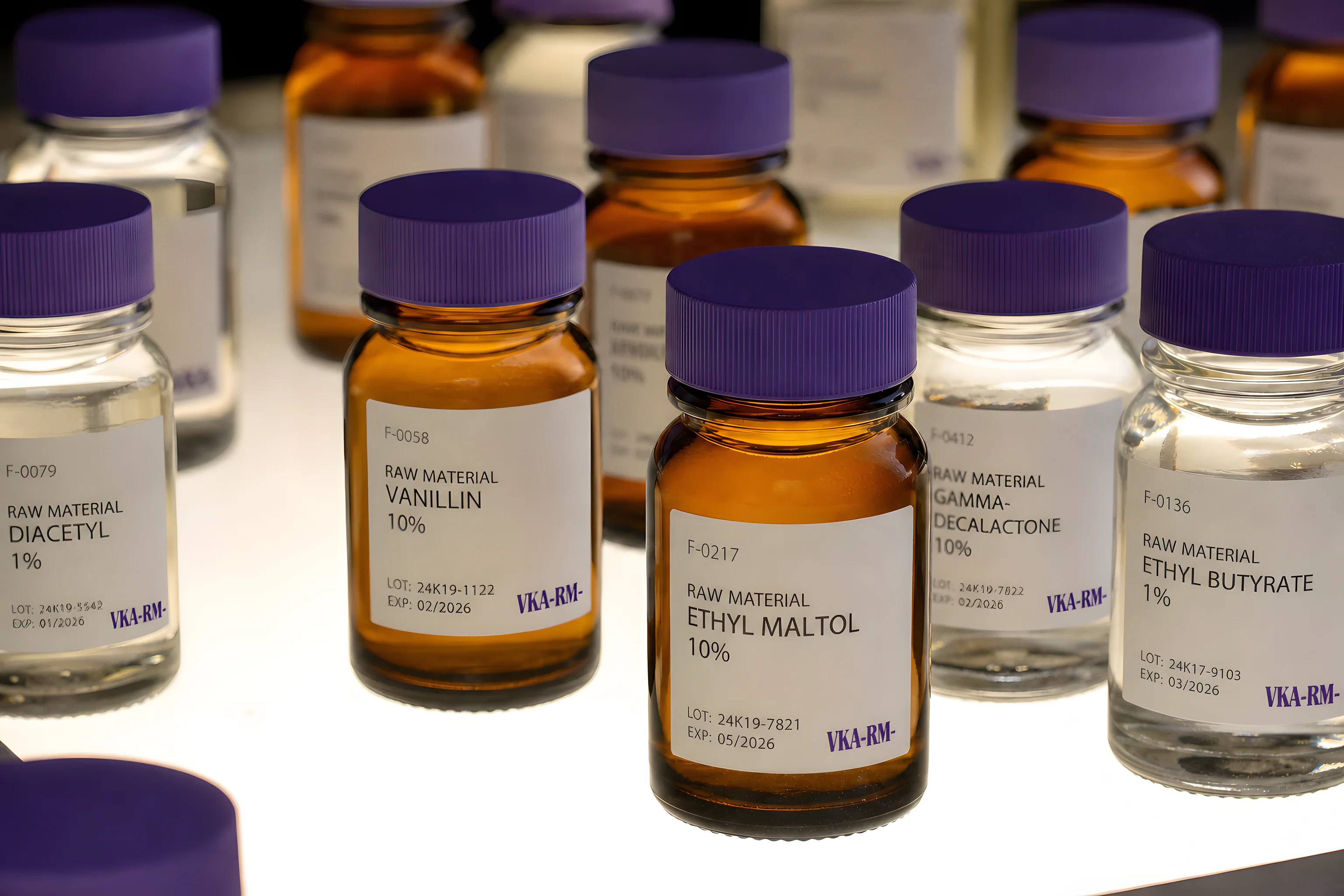 Amber VKA sample bottles on a light table